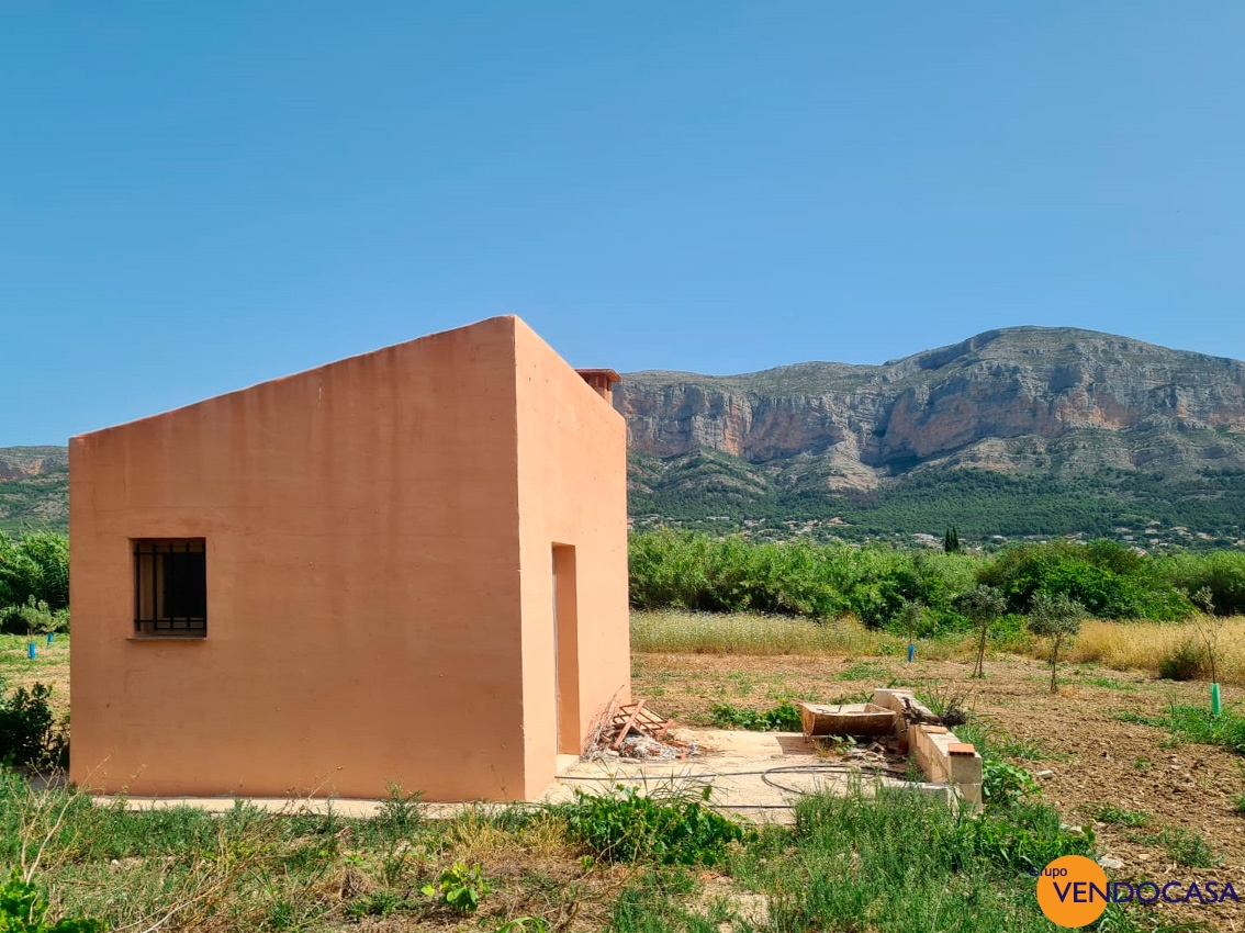 Little building on a large rustic plot