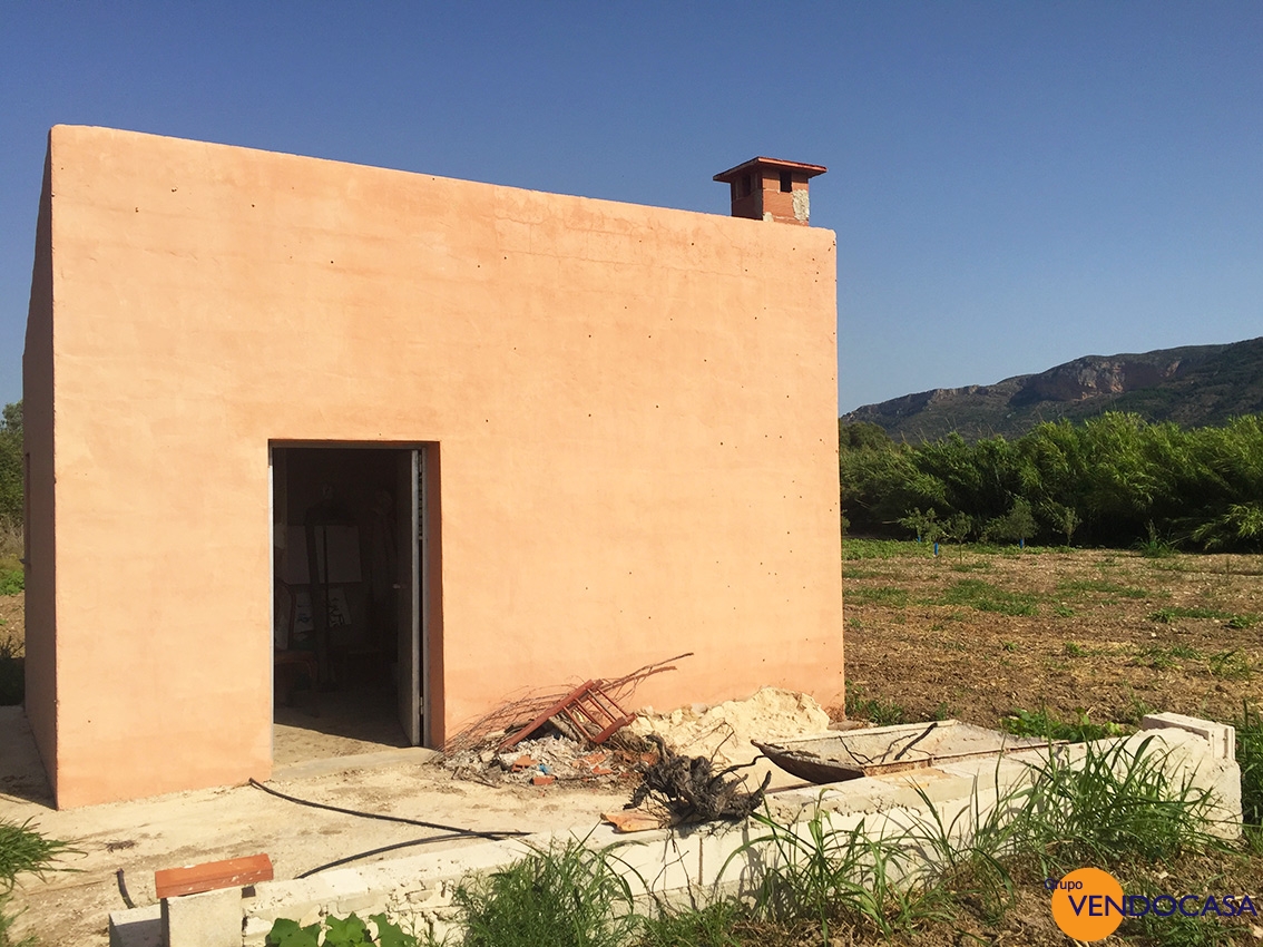 Little building on a large rustic plot
