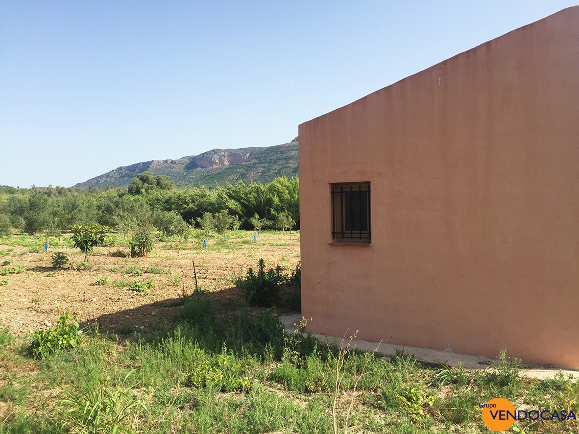 Little building on a large rustic plot
