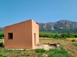 Little building on a large rustic plot