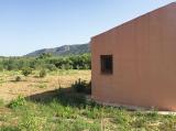 Little building on a large rustic plot