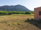 Little building on a large rustic plot