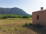 Little building on a large rustic plot