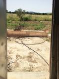 Little building on a large rustic plot